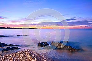 Twilight Mist Sea with rocks in Samila Beach, Songkhla.