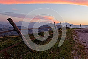 Twilight in the mountain fields and a pink sky