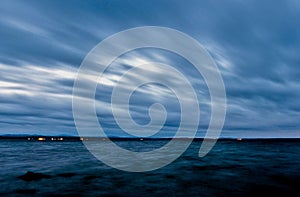 Twilight over the lake, dark blue sky