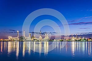 Twilight at petroleum refinery along the river