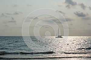 Twilight sky background. Colorful Sunset sky and cloud.vivid sky in twilight time background. Sunset and the sea with yacht.