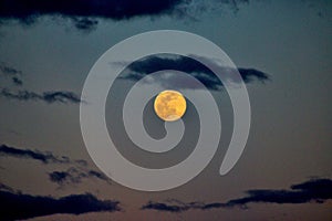 Twilight sky full moon rising over Lake Murray South Carolina