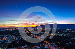 Twilight sky after sunset over city lights of Chiang Mai , Thailand