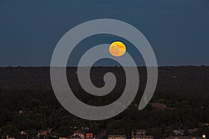 Twilight Super Full Moon Rising Landscape with Pale Pink Clouds