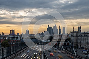 Twilight Tapestry: Moscows Cityscape Unfurls From Bridge at Dusk