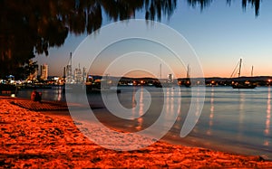 Twilight view across Nerang River to Southport from The Spit at Surfer`s Paradise photo