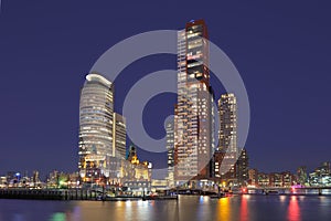 Twilight view on Kop van Zuid with high-rise buildings, Rotterdam, Netherlands