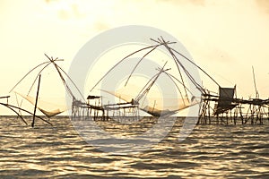 Twilight view of square dip net or Yo made of bamboo .