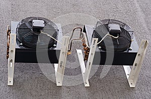 Twin Antminer Cooling Units on Textured Surface