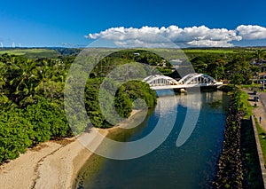 Twin arched bridge over the river Anahulu in Haleiwa on Oahu photo