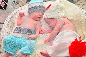 Twin babies, girl and boy sleeping