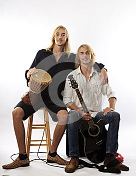 Twin brothers with their guitar and drum