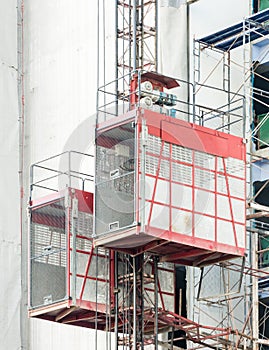 Twin construction elevator