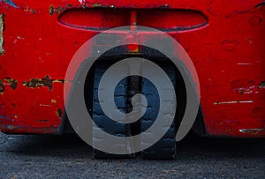 Twin coupled rear wheels of Electric three-wheel counter balance forklift truck in Red color.