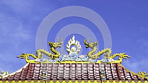 Twin dragon statue on roof