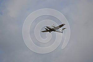 Twin engine airplane taking off