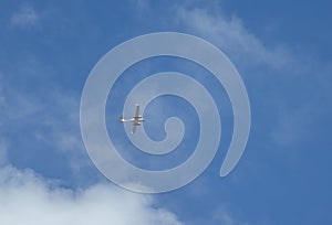 twin-engine plane against the background of clouds