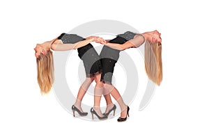 Twin girls bend behind