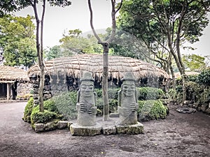 Twin Jeju idols (Dolharubang, the grandfather stones ) in Seon