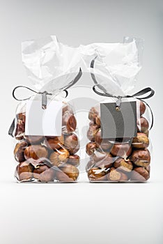 Twin luxury plastic bags of fresh chestnuts with blank labels