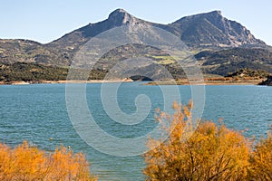 Twin peaks of Tagus Algarin and the Sima de las Grajas, by the reservoir Zahara-El Gastor, near Zahara de la Sierra photo