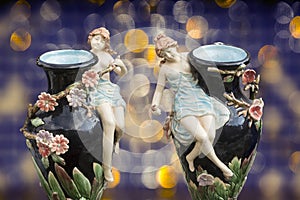 Twin porcelain vases with rich decoration