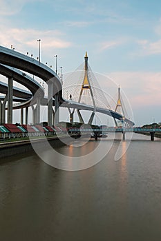 Twin suspension bridged crossing Bangkok river photo