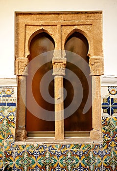 Twin window in the Cloister of the Monastery Sanctuary of the Virgen de Regla in Chipiona, Cadiz province, Spain.
