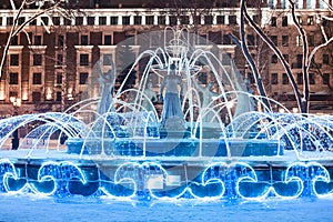 twinkling lights fountain in the center of Ufa, Russia. Christmas and New Year decorations and