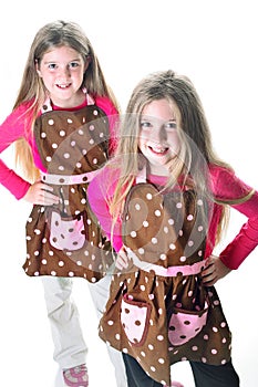 Twins in aprons