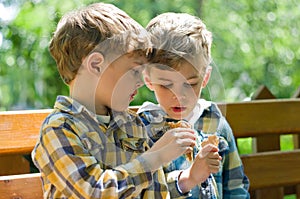 Twins eating ice cream