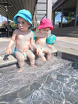 Twins at the pool