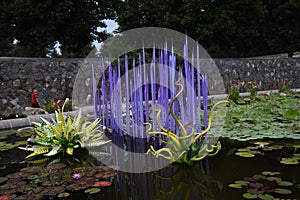 Purple flower piping by Chihuly blown glass at Asheville NC Biltmore gardens