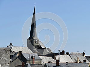 The twisted bell tower of the Saint-Symphorien church in Vieil-BaugÃ©