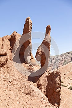 Twisted eroded sandstone in the desert of Skazka Canyon in Kyrgyzstan