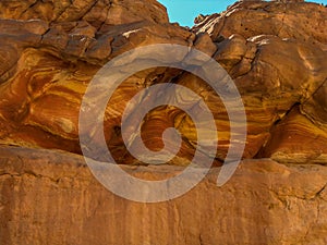 Twisted folds of coloured rock strata on the walls of the Coloured Canyon near Nuweiba, Egypt