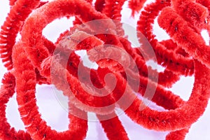 Twisted red pipe cleaners
