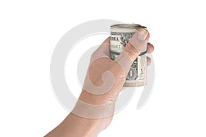 Twisted roll of dollars tightened rubber band in the hand