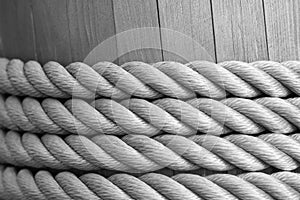 Twisted rope is reeled up on a wooden drum