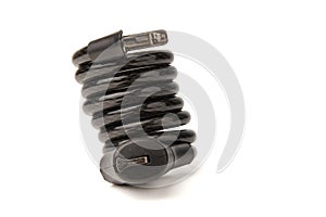 Twisted spiral new black bicycle lock isolated on white background