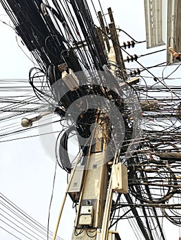 Twists of electric cables in the streets of Cambodia