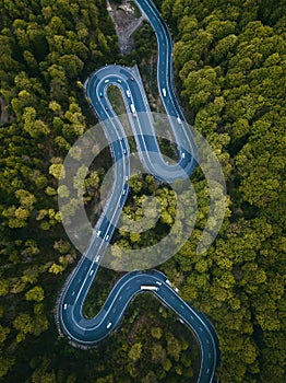 Twisty mountain road seen from above. Aerial view