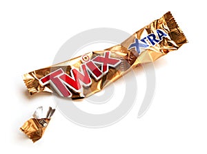 Twix Xtra chocolate bar empty crumpled wrapper isolated on white