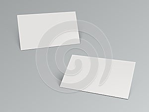 Two 3D Blank Business Card With Shadow On Gray