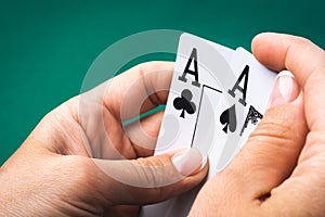 Two aces in girl hand
