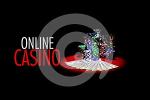 Two aces and Stack of gambling chips on red casino tabl