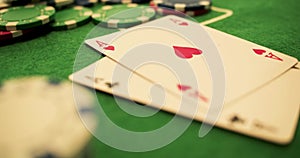 Two Aces Thrown on Green Casino Table - Chips/Checks/Casino Token- Poker. Extreme Close Up. Slow Motion