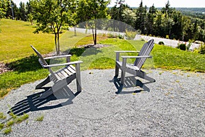 Two Adirondack chairs facing each other