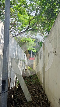 Two adjacent walls prevent outsiders from entering the house.