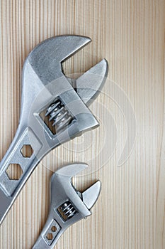 Two adjustable wrenches large and small